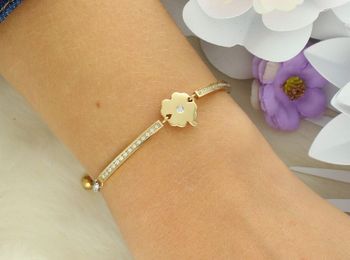 Elegancka bransoletka damska Nomination Italy Milleluci z zawieszką w kształcie koniczynki 028018 006. Stal szlachetna platerowana złotem, wysadzana cyrkoniami, regulowana długość 14–19 cm. Idealn (3).jpg